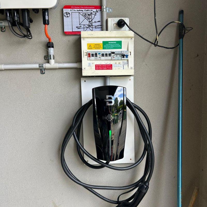 black Beny EV charging station mounted on a wall