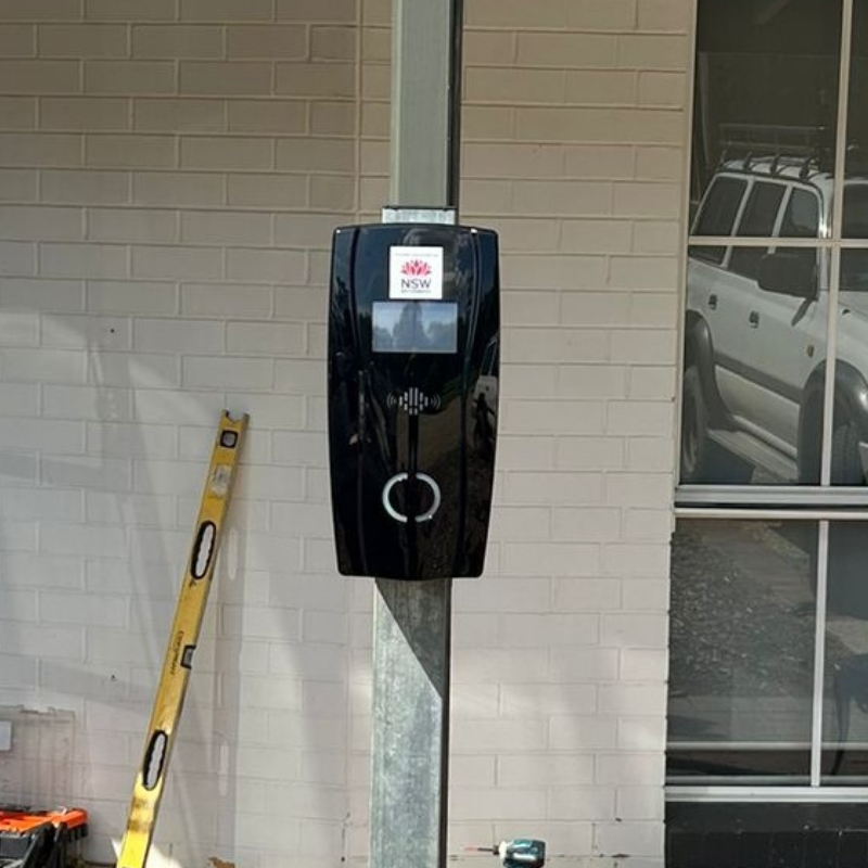 Black BENY EV charger on a pole