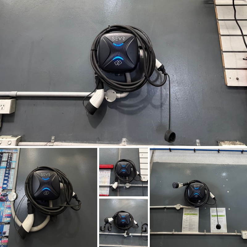 Black SEVR EV charging unit on a gray surface