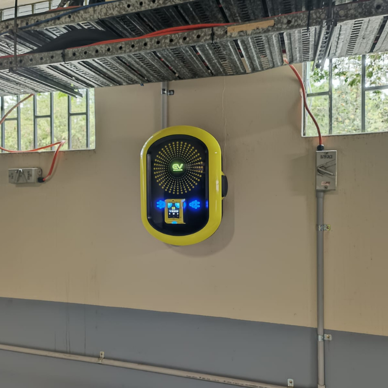 Nayax ev charging device mounted on a wall 