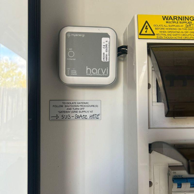Harvi EV charger mounted on a wall