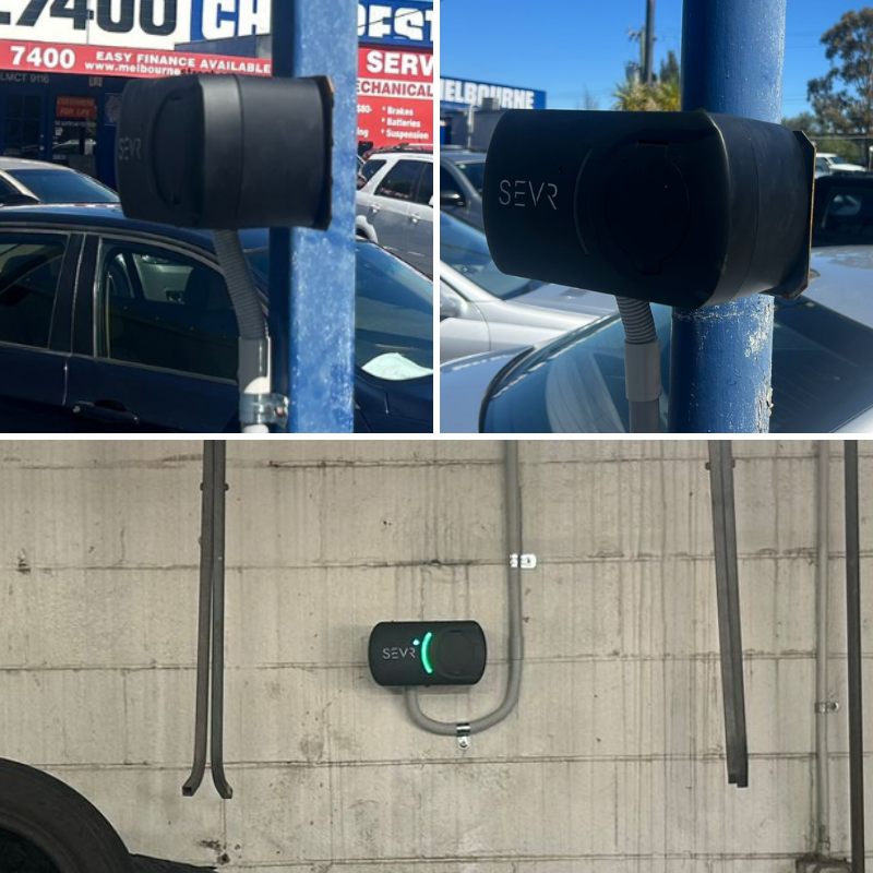 SEVR electric vehicle charging station attached to a pole and wall