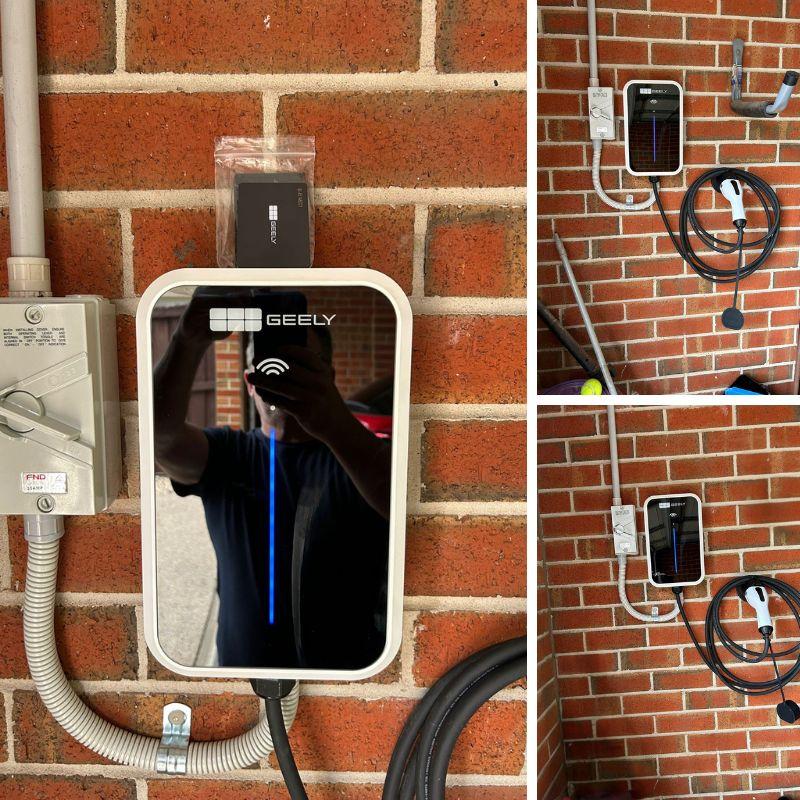 GEELY electric vehicle charging station mounted on a brick wall
